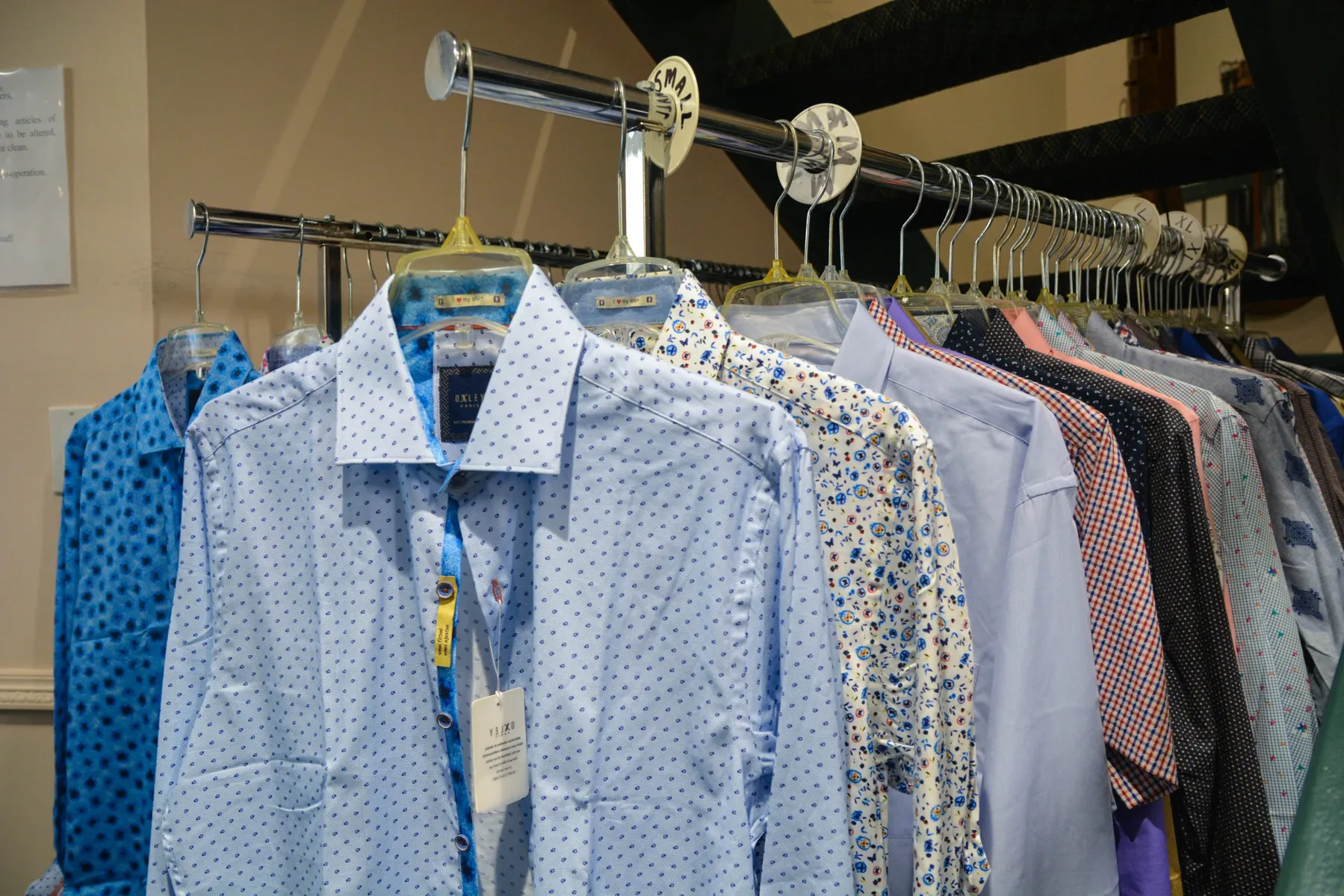 Rack of men's dress shirts to pair with suits