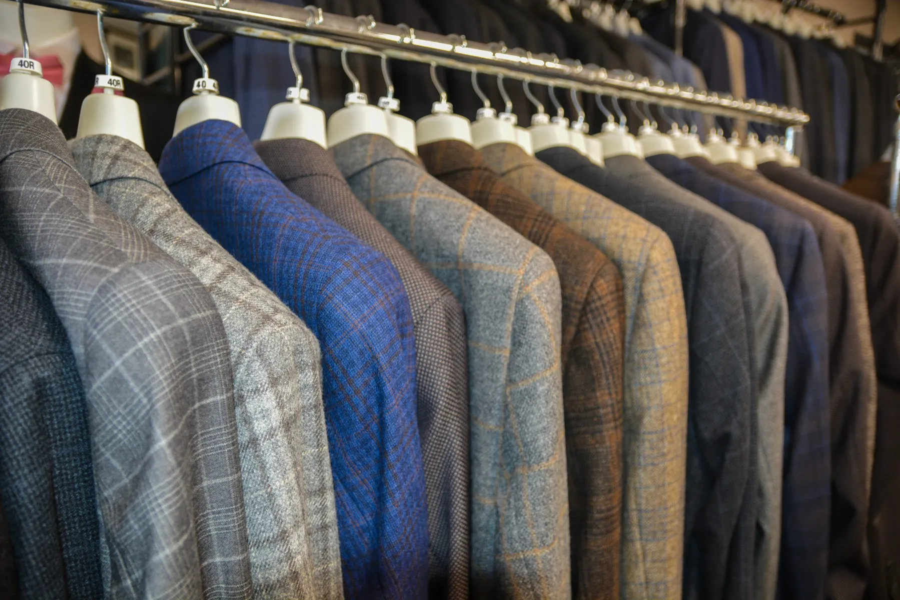 Row of men's suits for sale